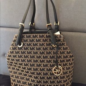 Michael Kors  New with tags Black and Tan canvas